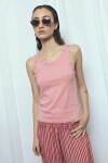 Musculosa con ojalillos rosa