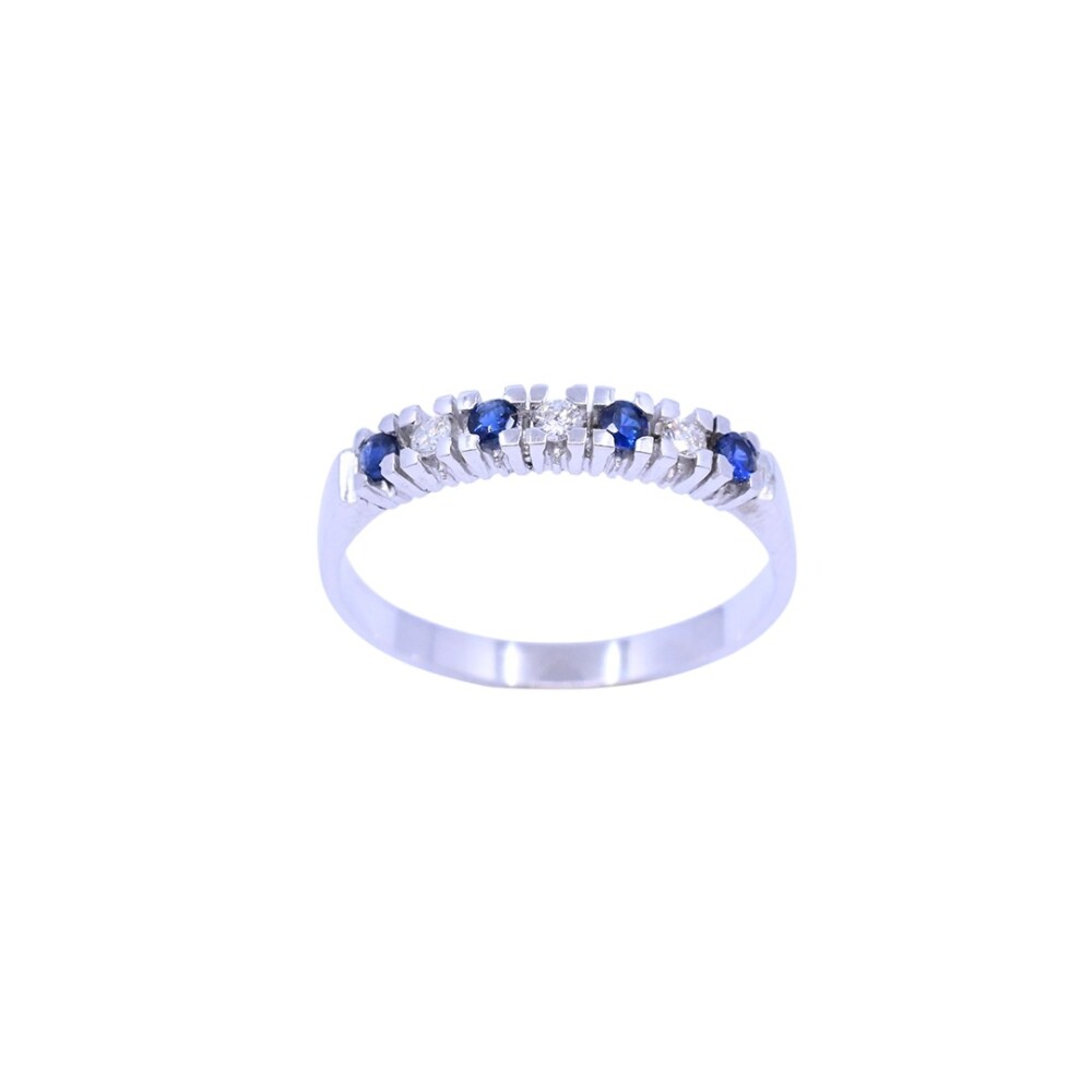 Anillo oro 18 k blanco con zafiros azules y brillantes. Anillo oro 18 k blanco con zafiros azules y brillantes.