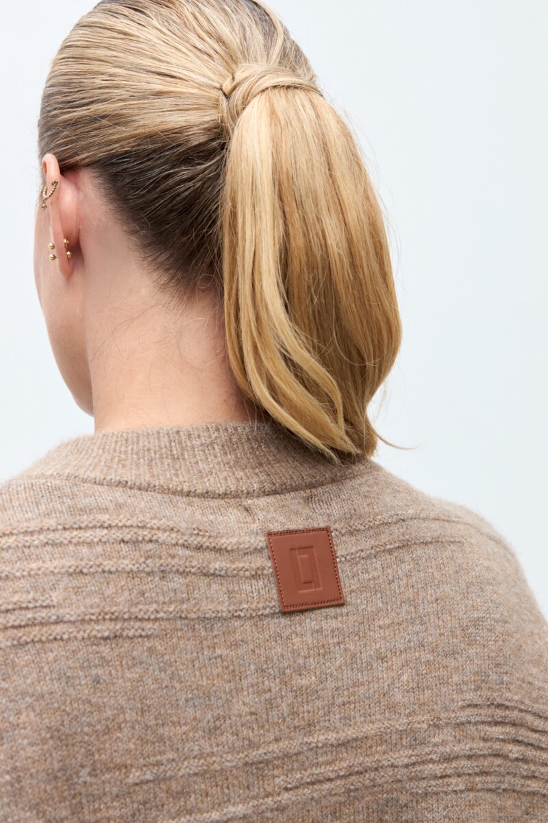 Capa tejida beige melange