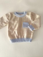 Buzo puño celeste beige Buzo puño celeste beige