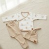 Primer muda PILIM estampada beige