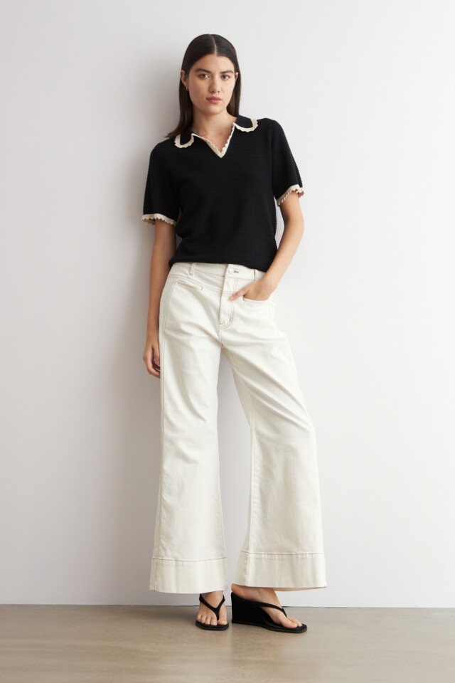 Sweater cuello polo manga corta negro