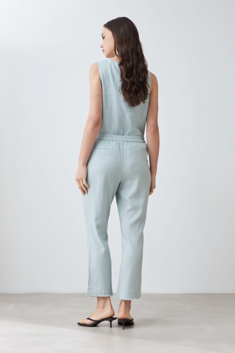 Pantalón de lino con efecto desflecado verde agua