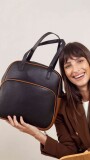 MOCHILA CLARA NEGRO Y SUELA
