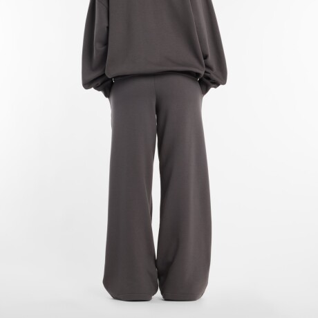 Pantalón New Balance de Dama -Reimagined Fleece- WB61I4PUABR DARK GREY