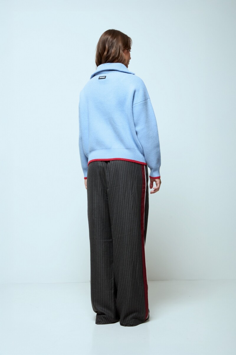 Sweater tejido con cierre celeste
