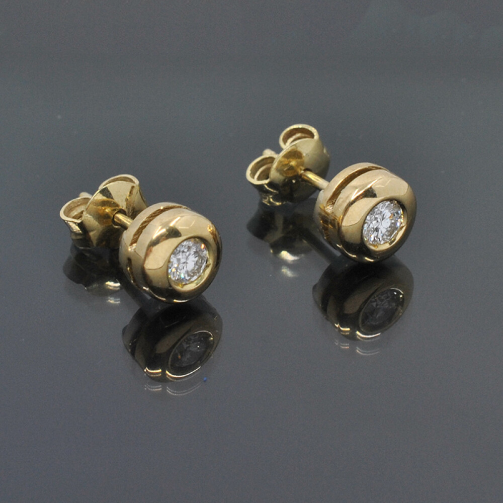Caravanas oro 18k y brillantes Caravanas oro 18k y brillantes