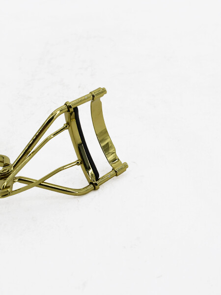 ARQUEADOR DE PESTAÑAS DORADO