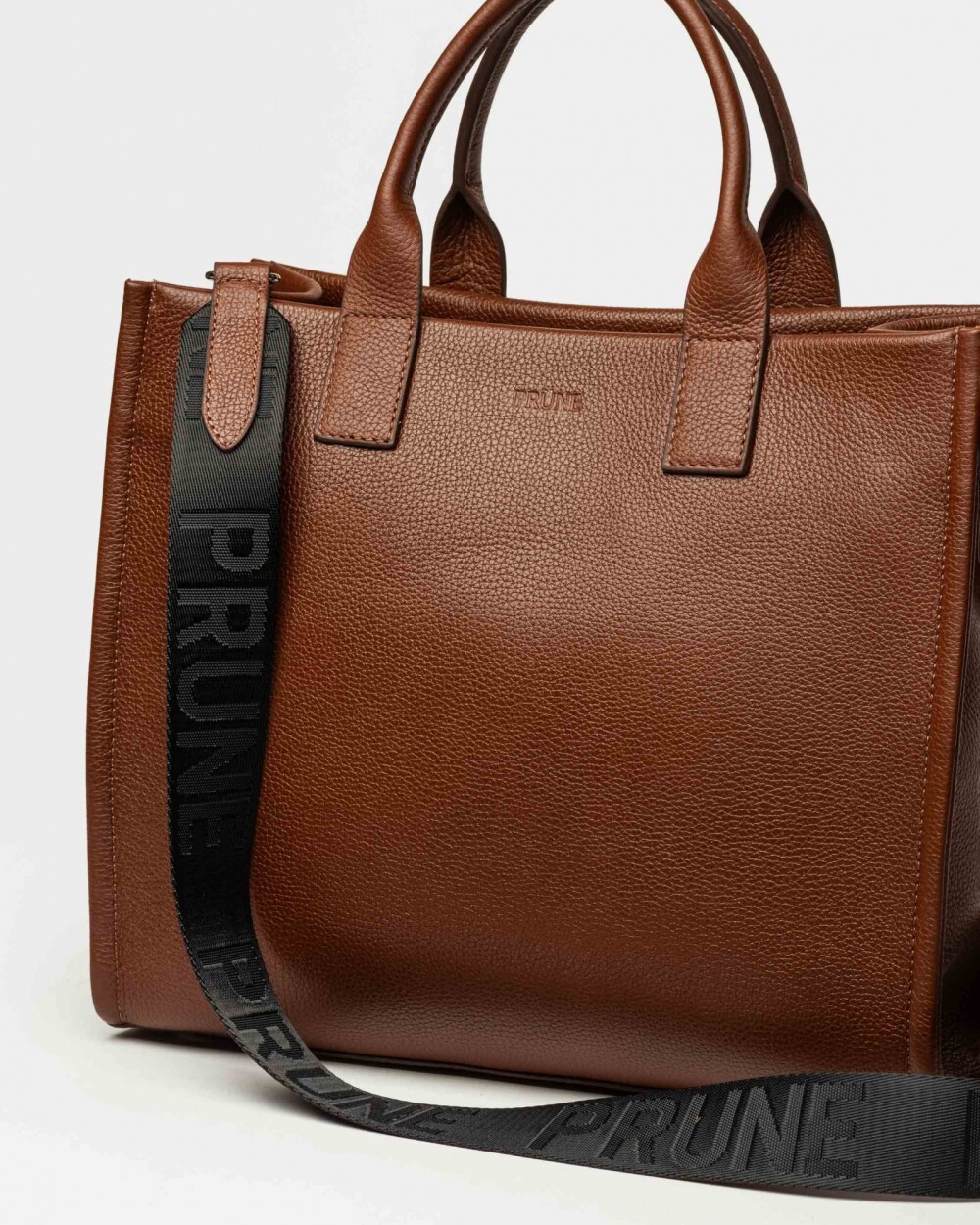 Cartera de mano Capri en cuero graneado Tabaco Niquel