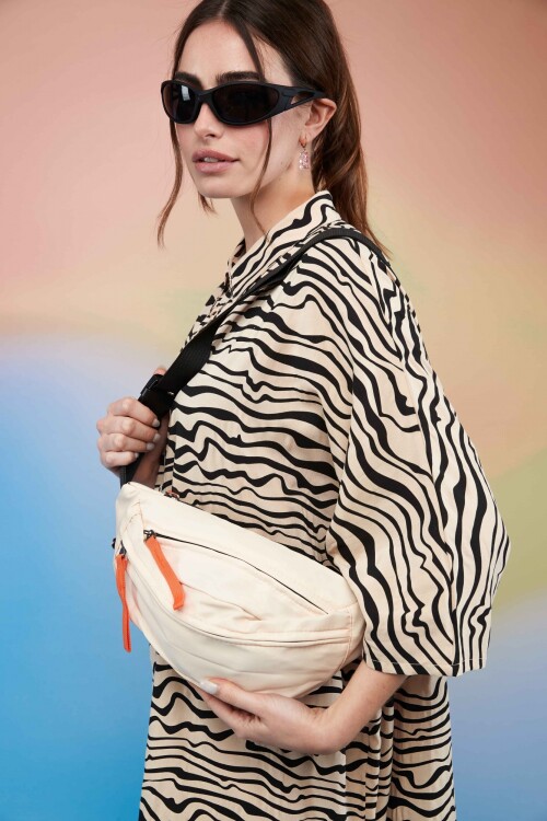 Riñonera Clau Beige