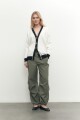 Cardigan con cinta decorativa crudo