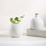 FLORERO DE RED CIRCULAR CERAMICA 9.5x9.5x8CM NATURAL FLORERO DE RED CIRCULAR CERAMICA 9.5x9.5x8CM NATURAL