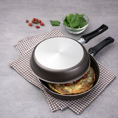Sarten Doble Omeletera Tramontina Antiadherente 24cm 1,1lts Sarten Doble Omeletera Tramontina Antiadherente 24cm 1,1lts