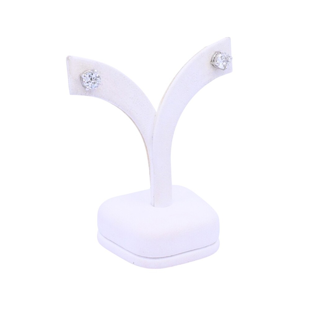 Caravanas oro 18k blanco y brillantes engarce 4 puntas. Caravanas oro 18k blanco y brillantes engarce 4 puntas.