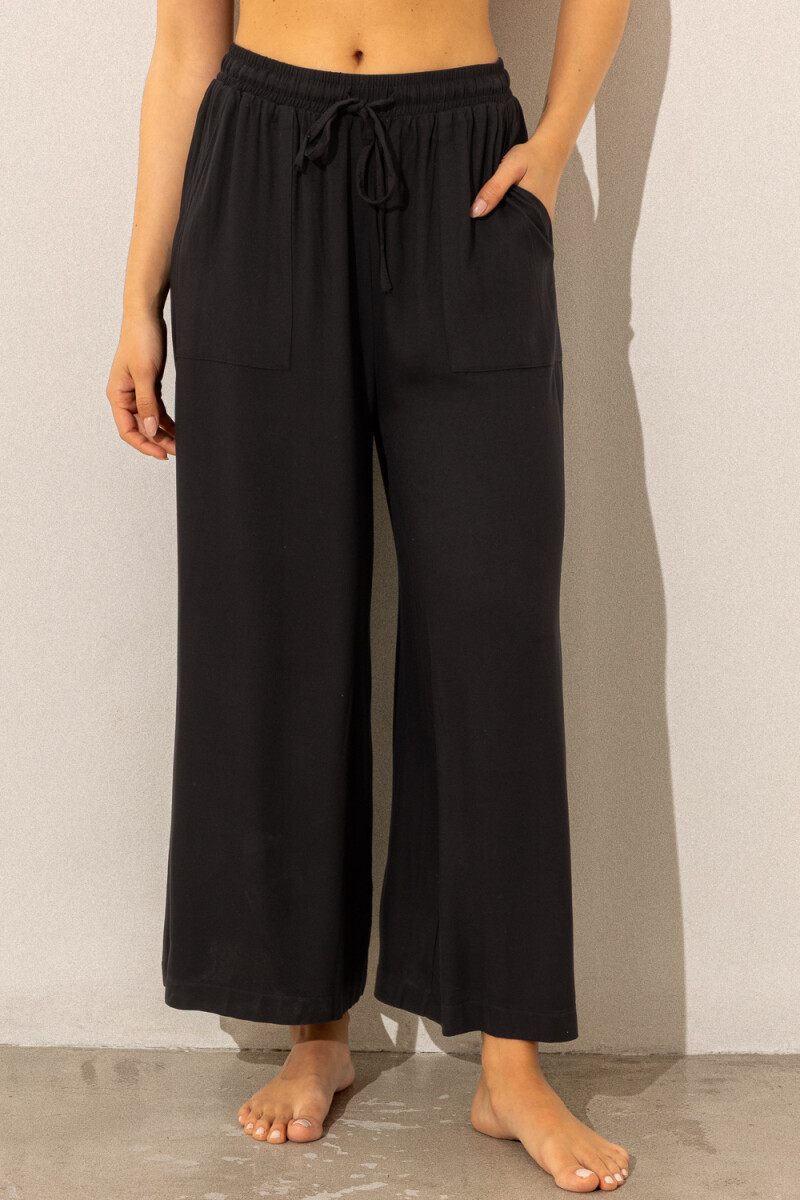 Pantalon river Negro