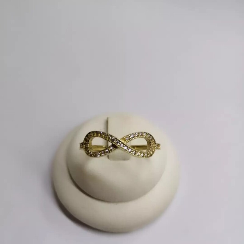 Anillo infinito Oro 10kt. con Zirconias Anillo infinito Oro 10kt. con Zirconias