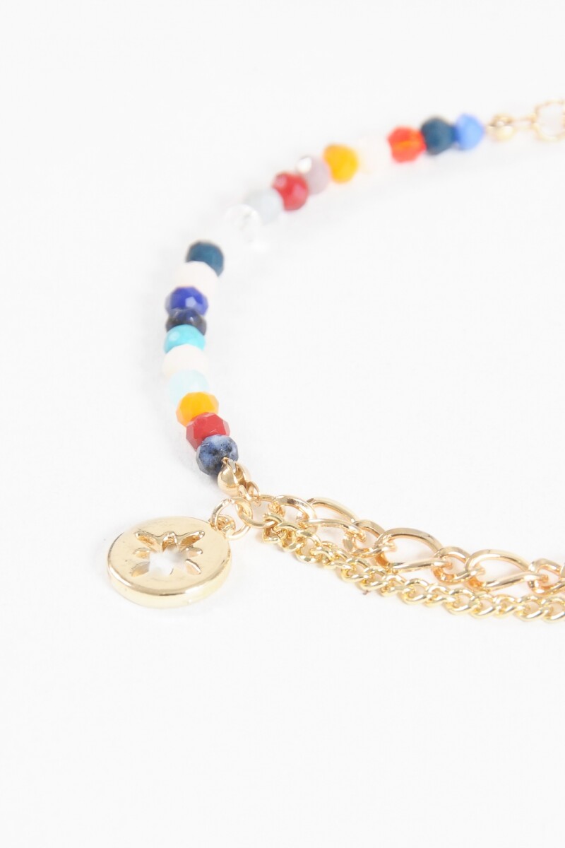 Pulsera dije estrella con piedras dorado