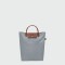 Longchamp - Cartera Tote plegable, de nylon y asa corta, Le pliage M Gris