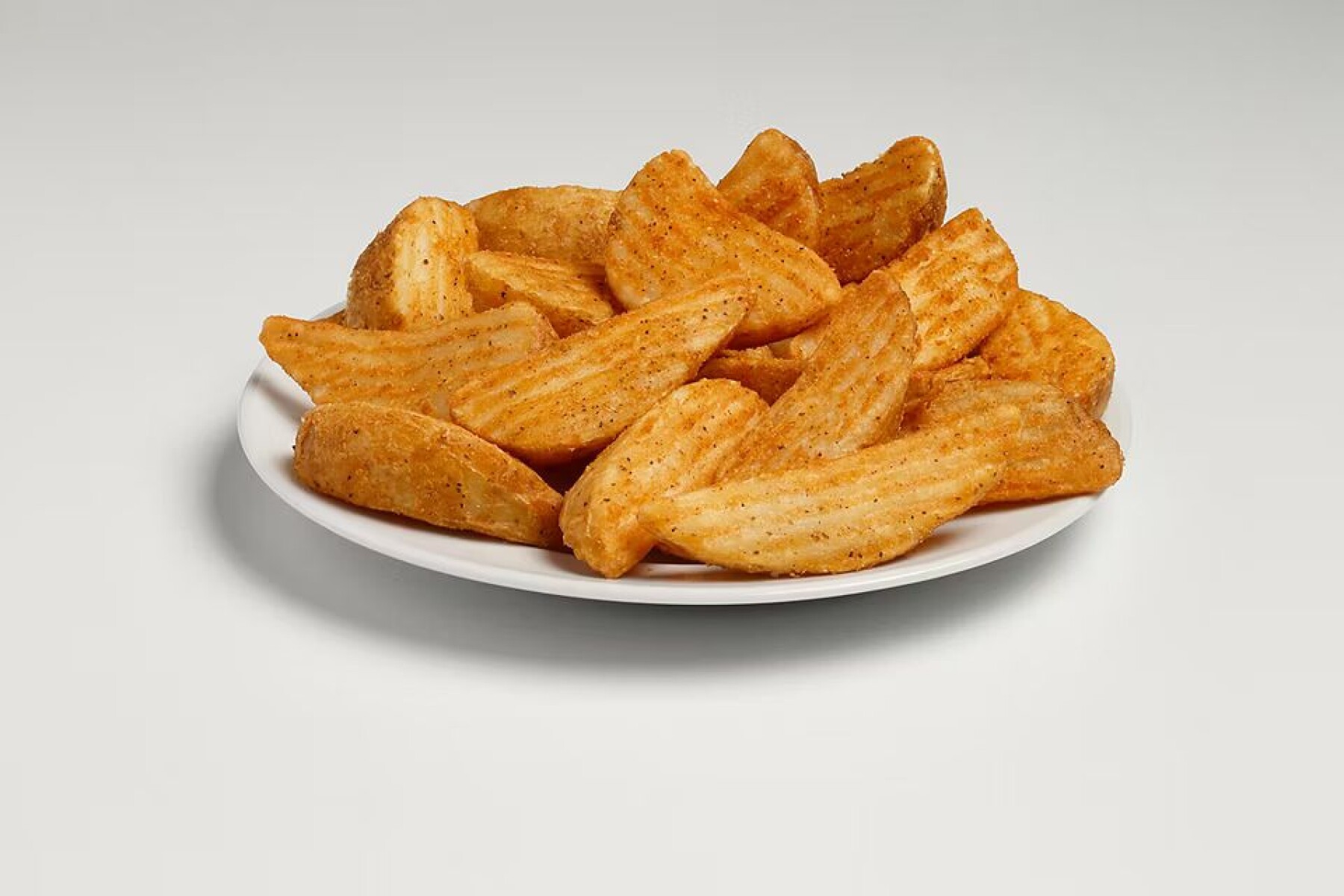 PAPAS RUSTICAS CONDIMENTADAS 1KG (WEDGES) 