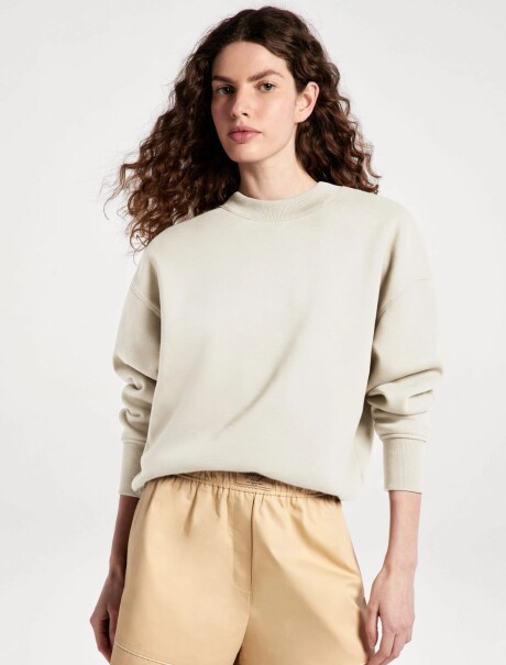 BUZO CON PUÑOS ELASTIZADOS BEIGE