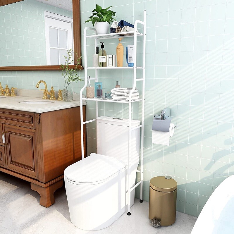 Estante mueble organizador sobre inodoro blanco
