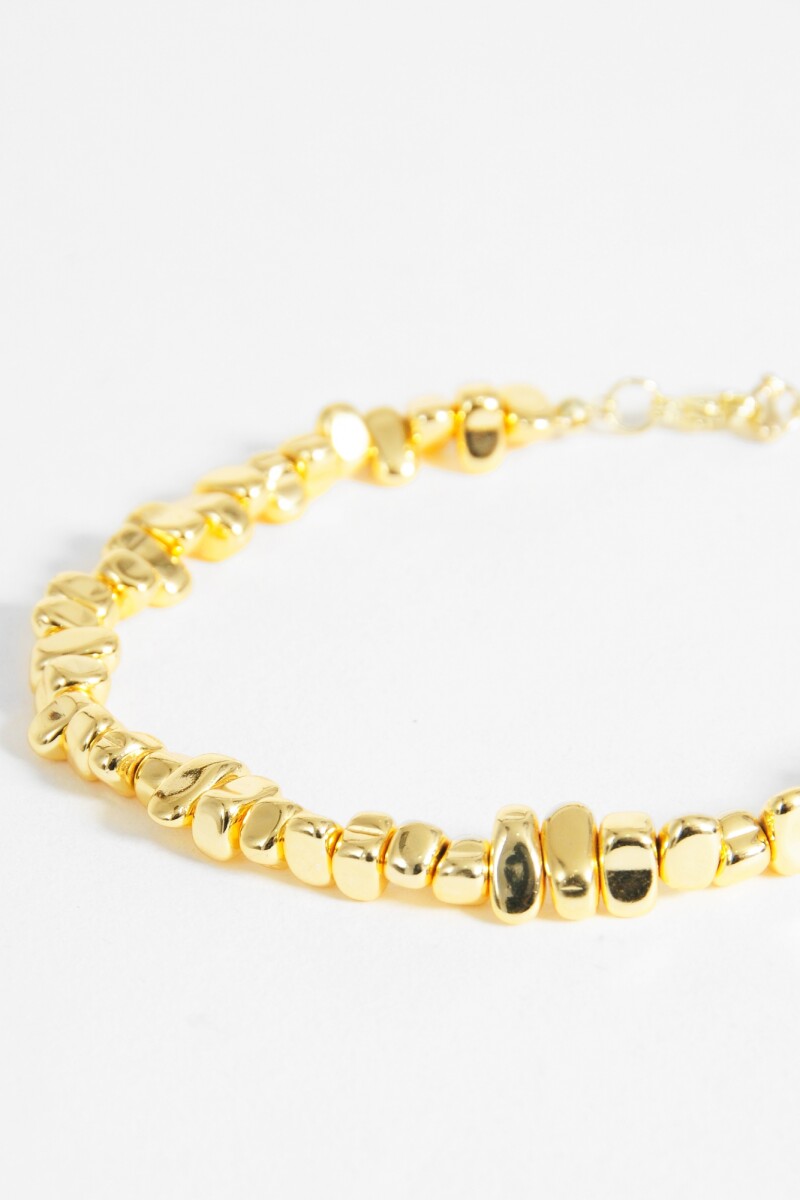 Pulsera metálica dorado