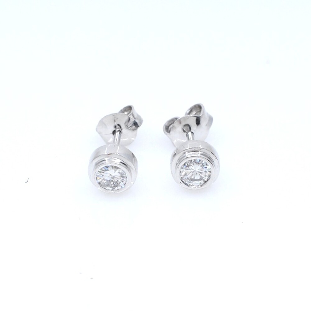Caravanas en oro blanco 18k y brillantes Caravanas en oro blanco 18k y brillantes