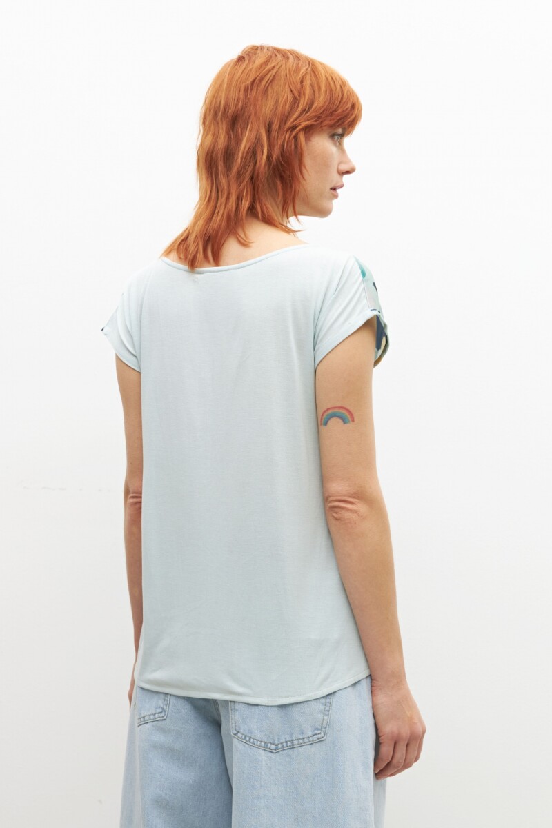 Blusa frente estampado hojas magnolia verde pastel