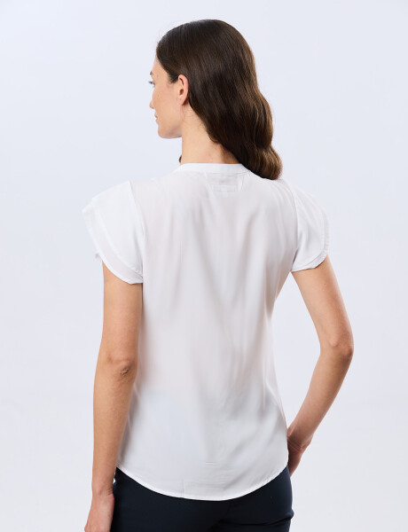 BLUSA CON VOLADOS Blanco