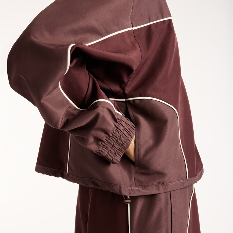 Campera Lifestyle New Balance de Dama Trackside WJ6279FYYLR BROWN