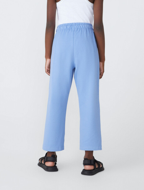 PANTALÓN AMPLIO CON BOLSILLOS CELESTE