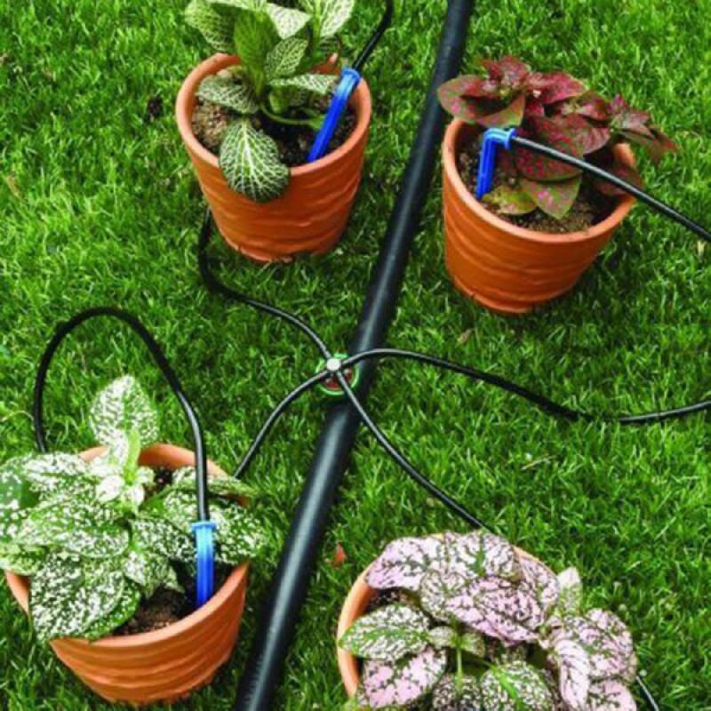 Cuatro goteros 2,6lts/hr con micro tubo y distribuidor Cuatro goteros 2,6lts/hr con micro tubo y distribuidor