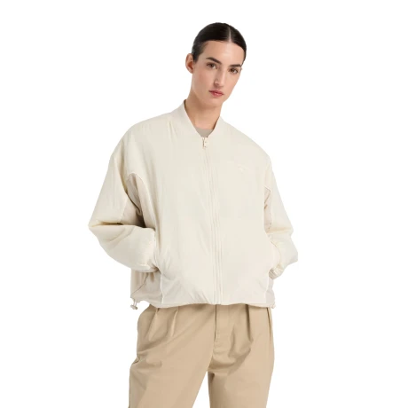 Campera de Dama New Balance -Reimagined Bomber- WJ51502LIN BEIGE