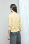 Cardigan con detalle de pespuntes crudo