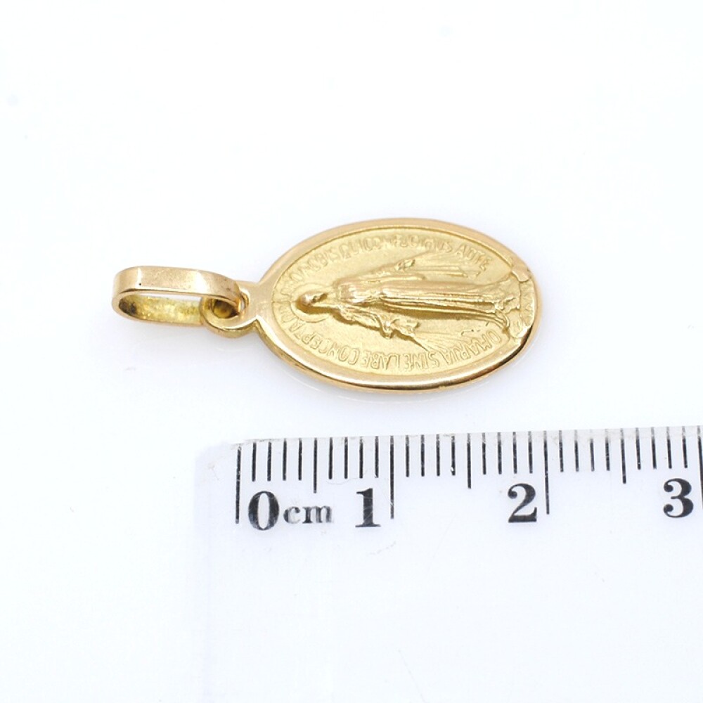 Medalla de oro 18k virgen milagrosa. Medida: 20 mm x 13mm aprox. Medalla de oro 18k virgen milagrosa. Medida: 20 mm x 13mm aprox.