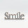 FRASE DECORATIVA SMILE EN MDF GRIS