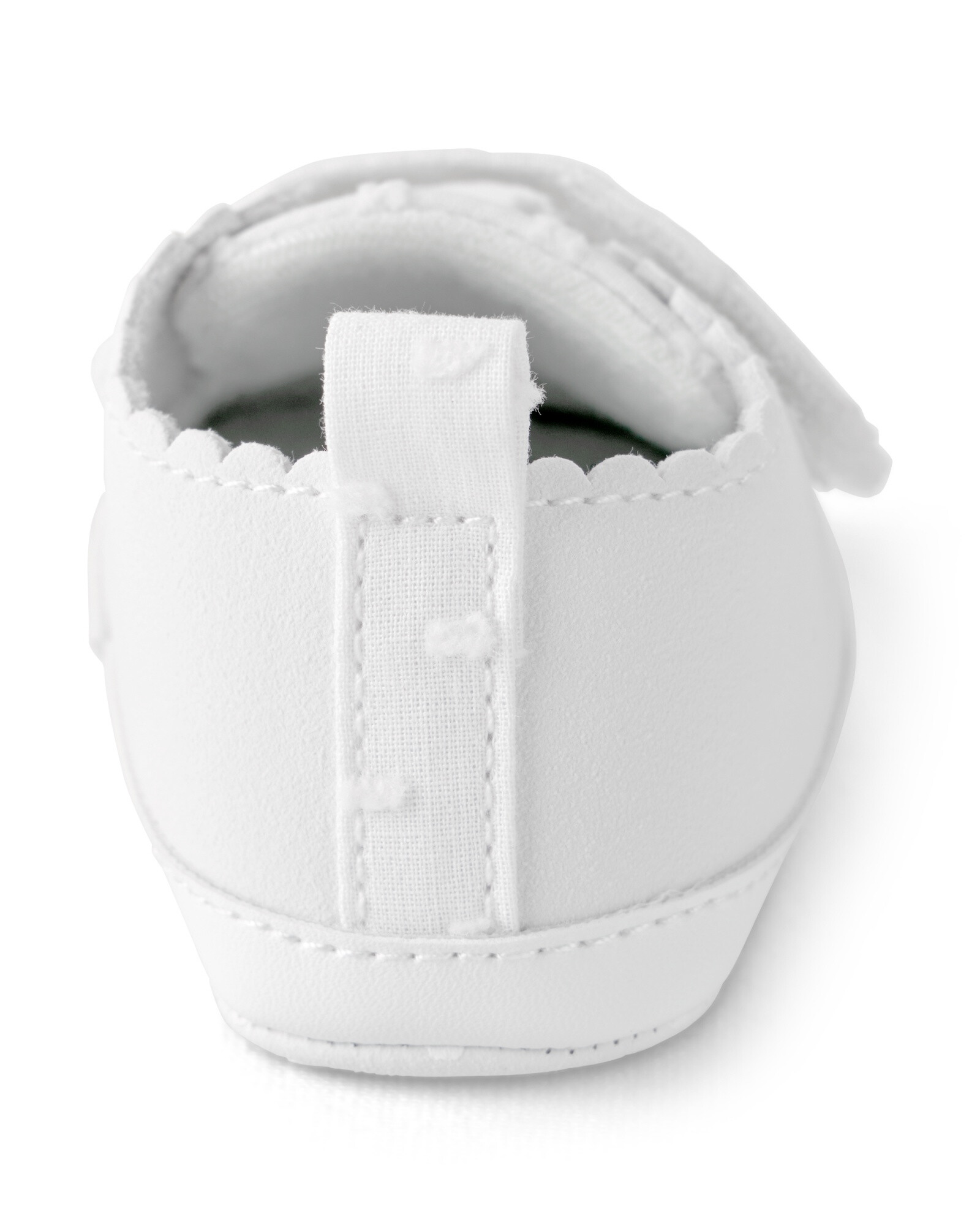 Zapatitos blancos, con velcro, bordes festoneados y lunares bordados Sin color