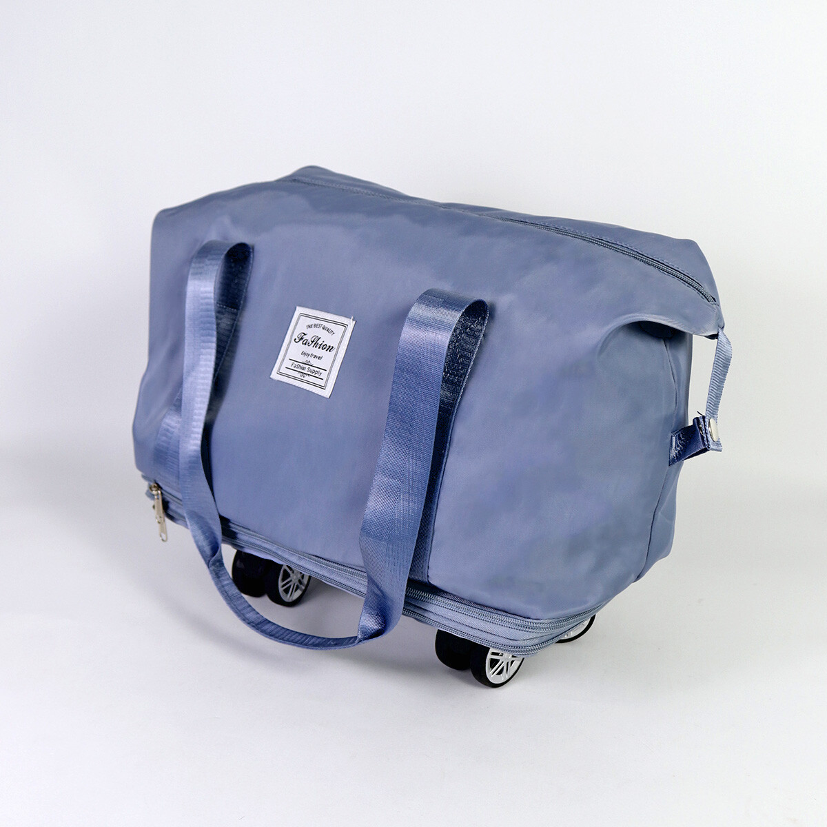 BOLSO AZUL P/VIAJE C/RUEDITAS 39X20X34CM 