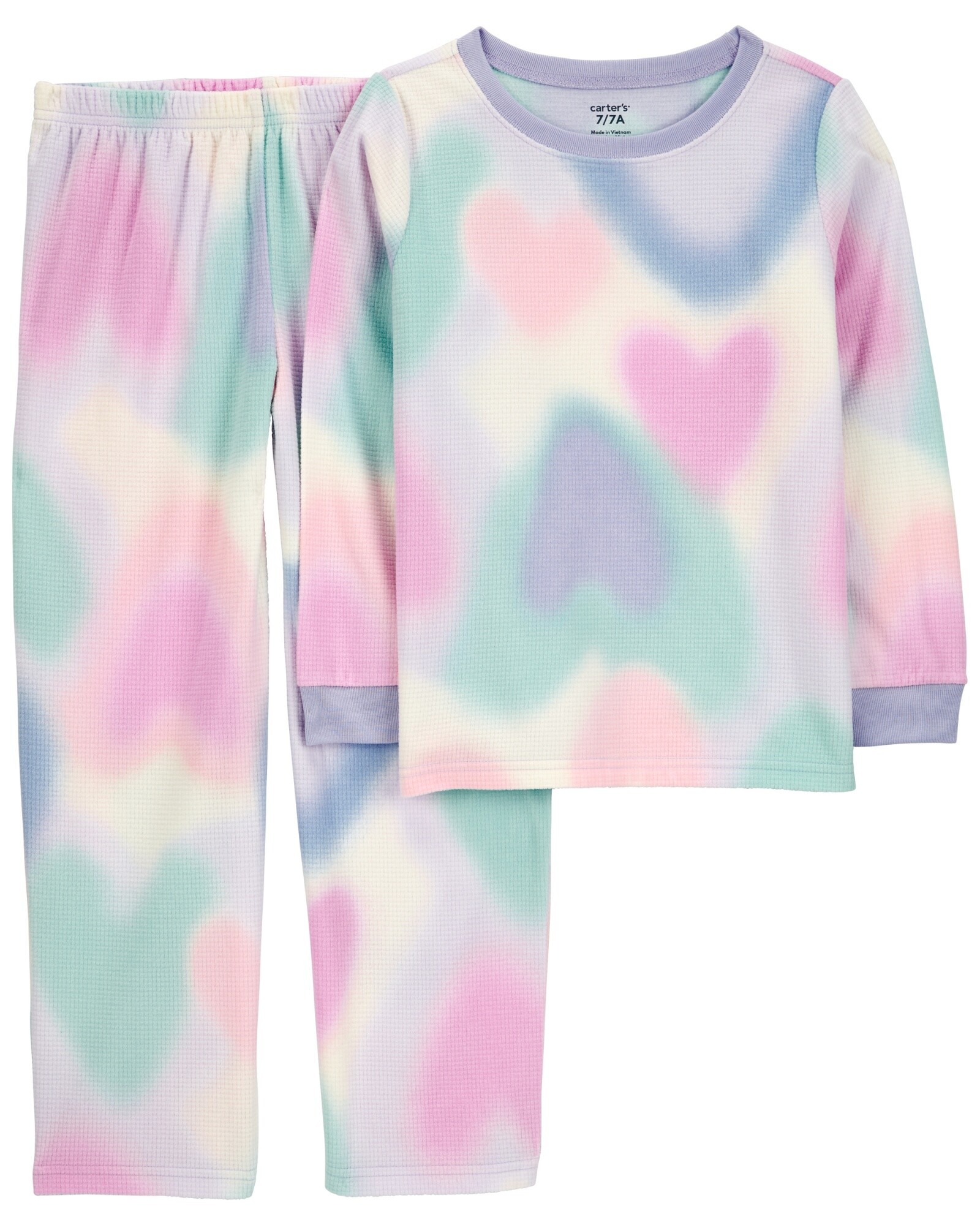 Pijama dos piezas de poliéster, pantalón y remera manga larga, diseño corazones Sin color