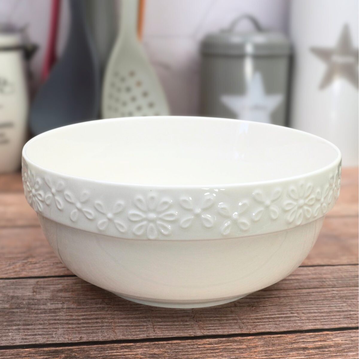 Bowl de cerámica con labrado de flores 