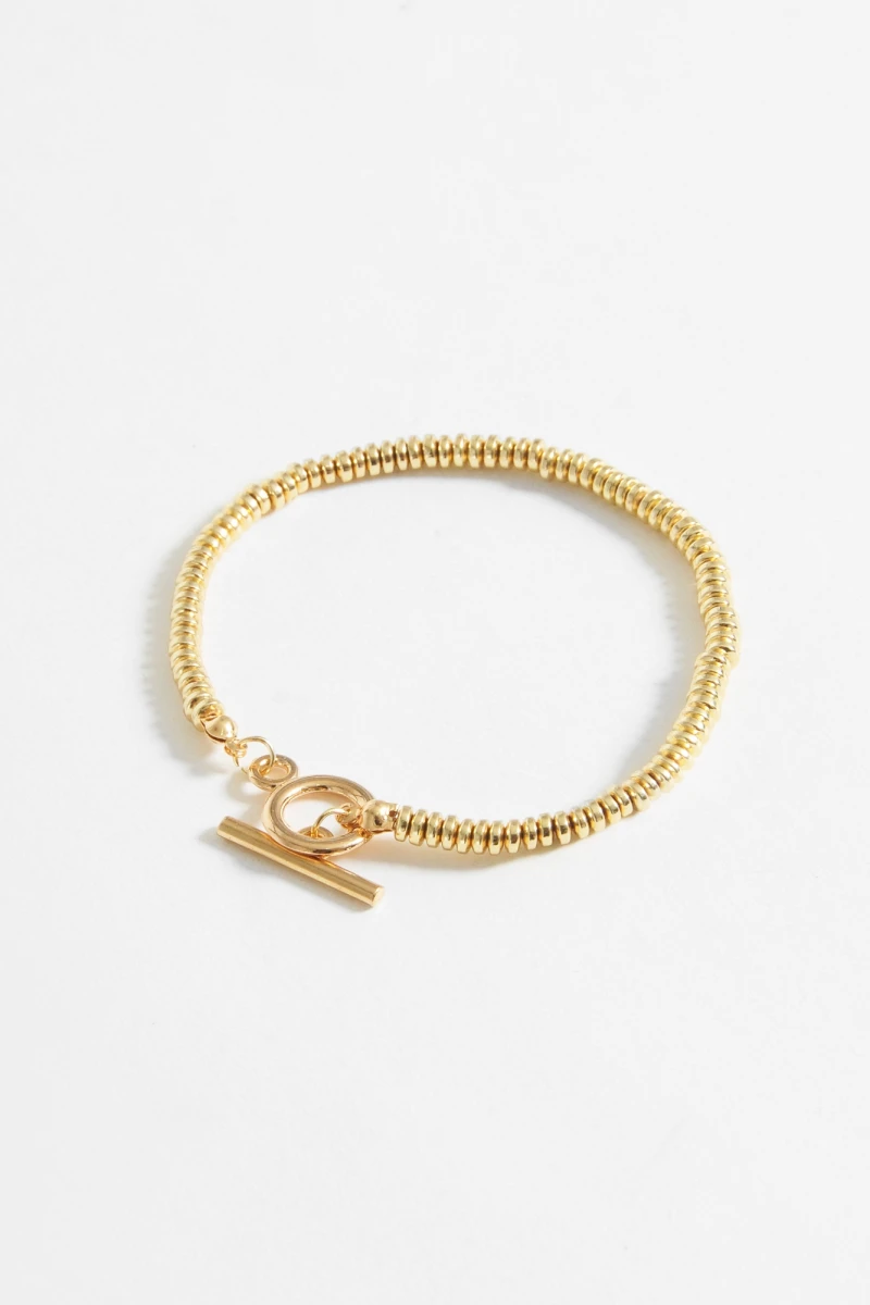 Pulsera cuentas metálicas dorado