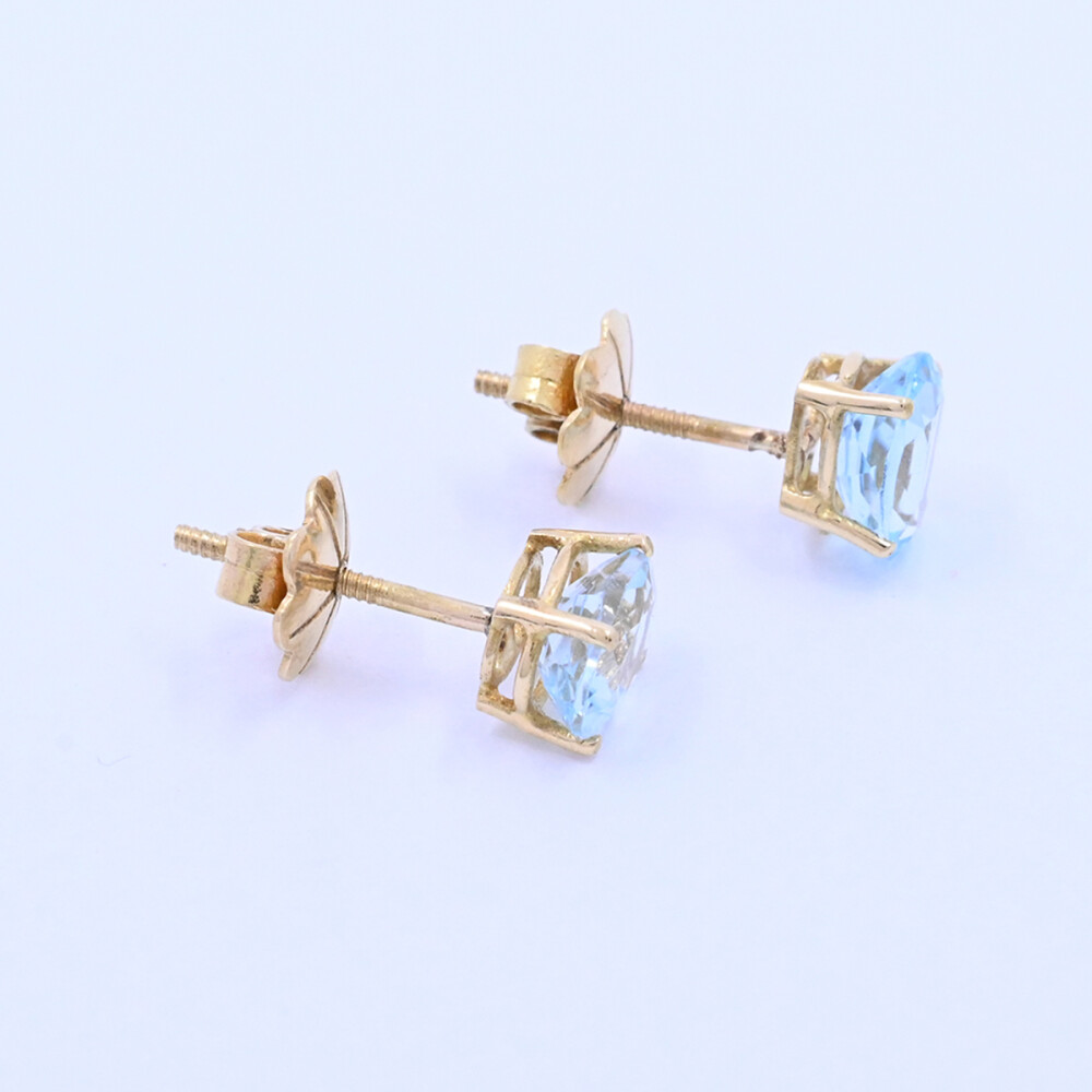 Caravanas oro 18k con topacios celestes oval. Caravanas oro 18k con topacios celestes oval.