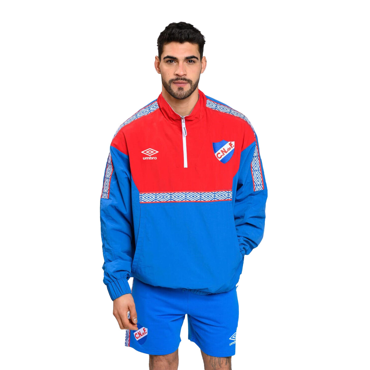 Buzo de Hombre Umbro Nacional Medio Cierre - Azul Francia - Rojo 