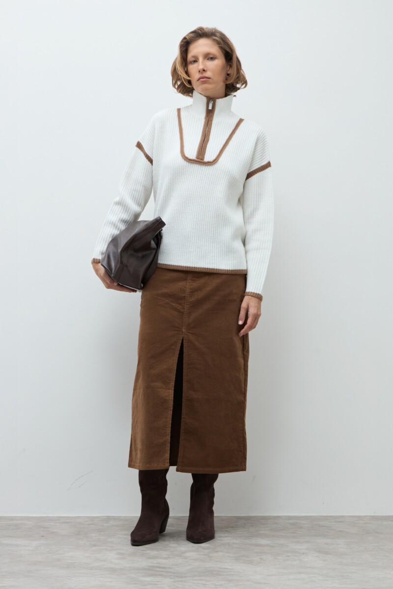 Sweater vivo en contraste crudo