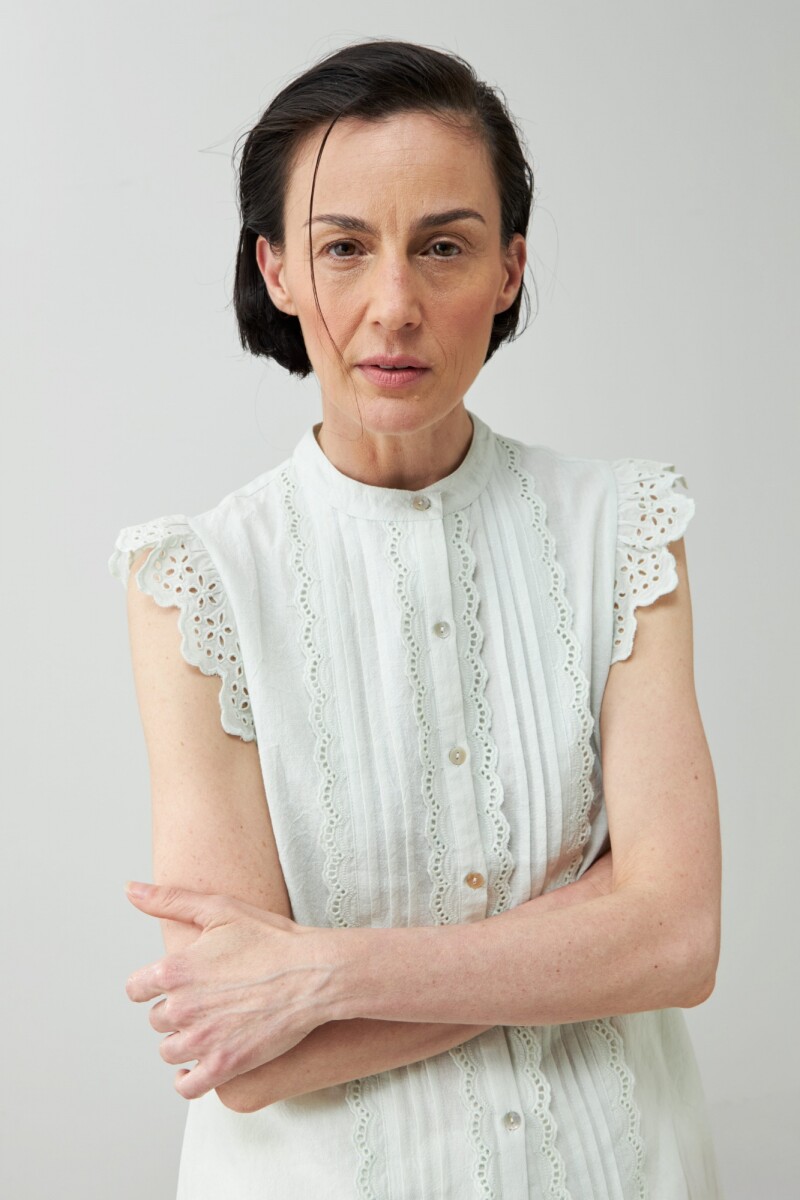 Camisa romántica sin mangas verde agua