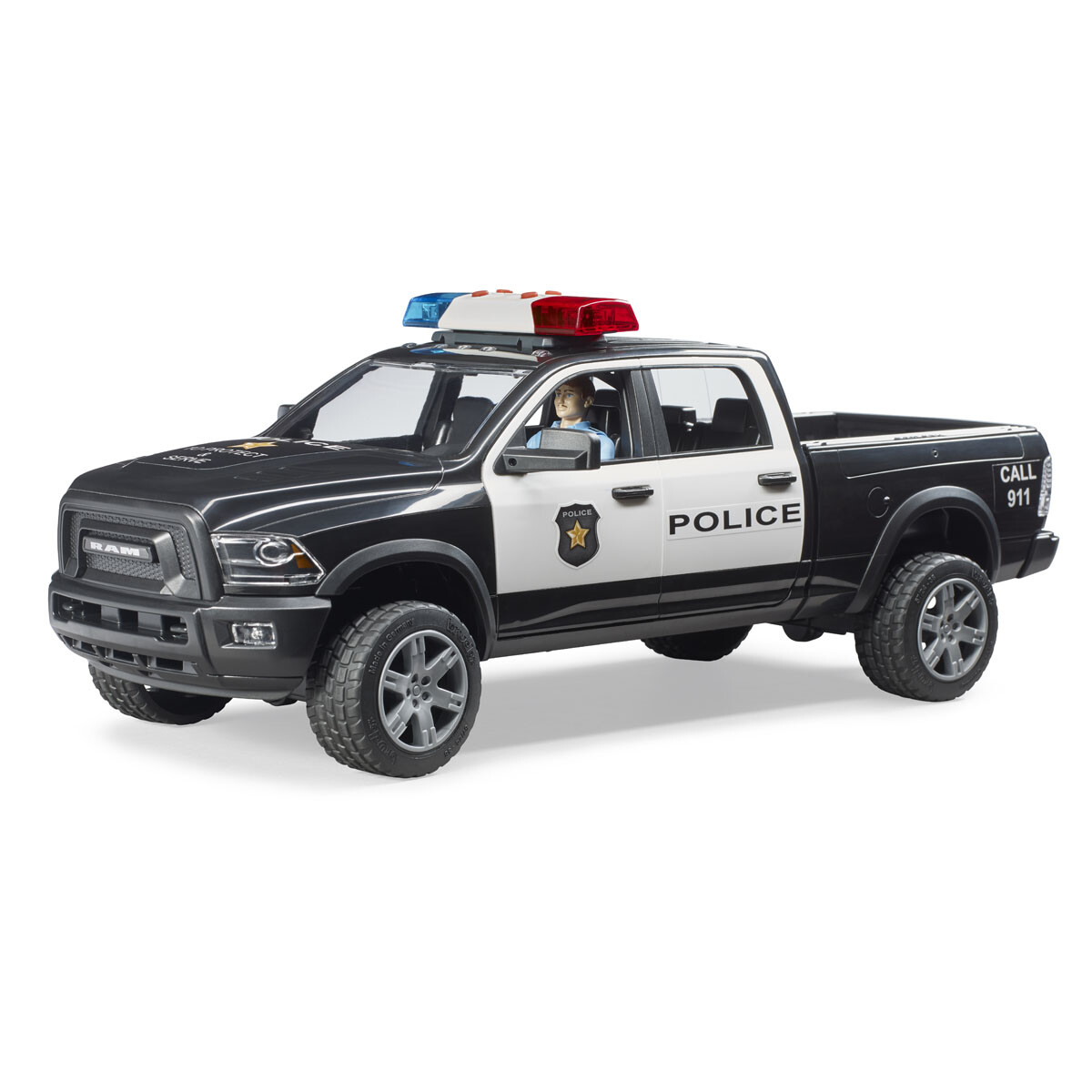Camioneta policial RAM 2500 con agente de policía a bordo Bruder 