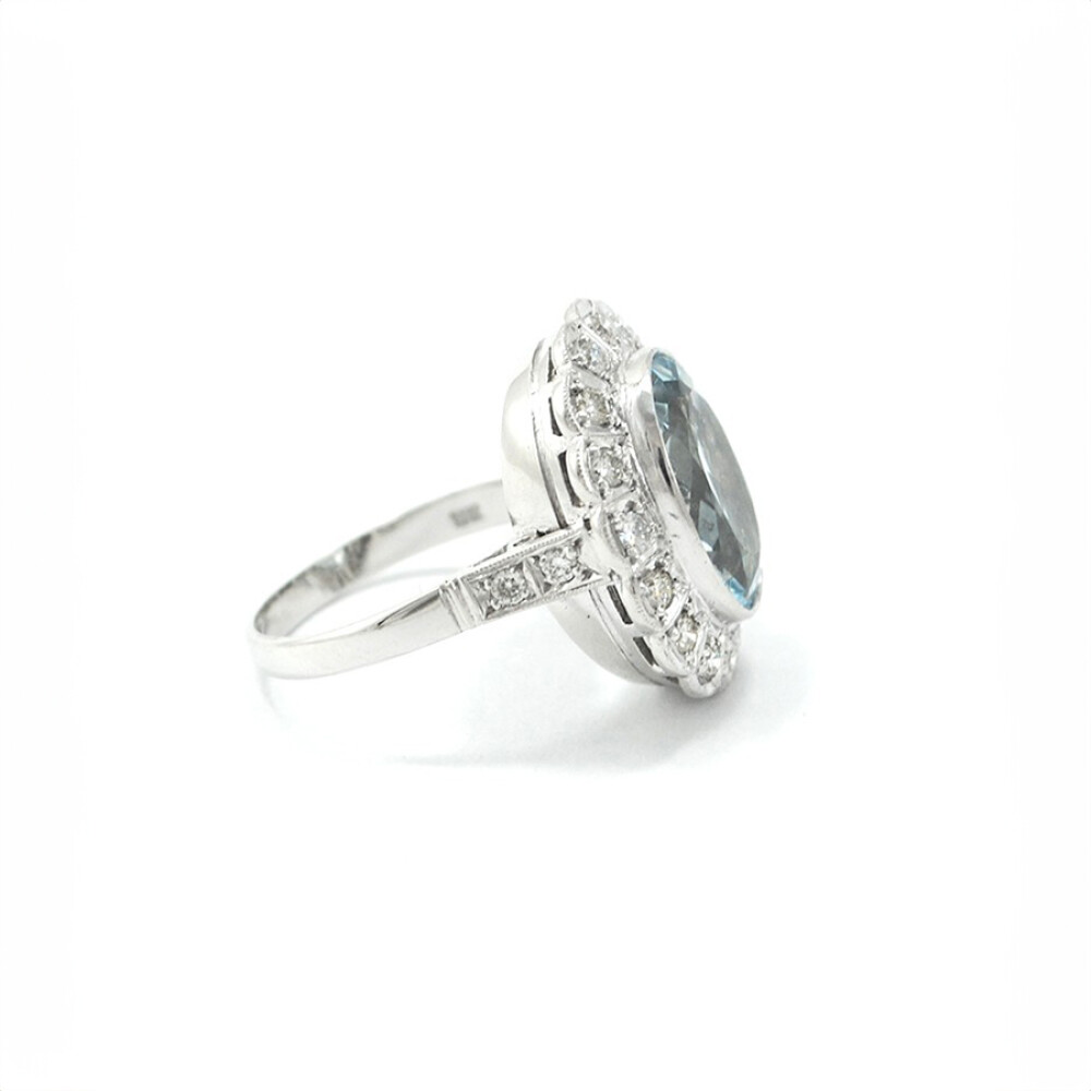 Anillo Oro 18K Blanco Con Aguamarina Central Y Brillantes Anillo Oro 18K Blanco Con Aguamarina Central Y Brillantes