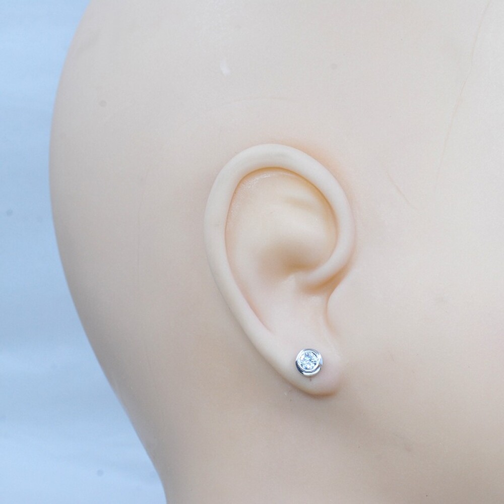 Caravanas en oro blanco 18k y brillantes Caravanas en oro blanco 18k y brillantes