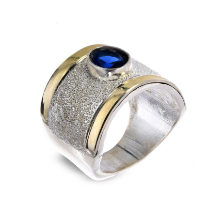 Anillo de plata 925 y double en oro 18 ktes con circonia. Anillo de plata 925 y double en oro 18 ktes con circonia.