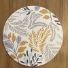 Individual Impermeable Circular Estampa Flores Mostaza